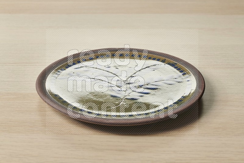Decorative Pottery Plate on Oak Wooden Flooring, 15 degrees