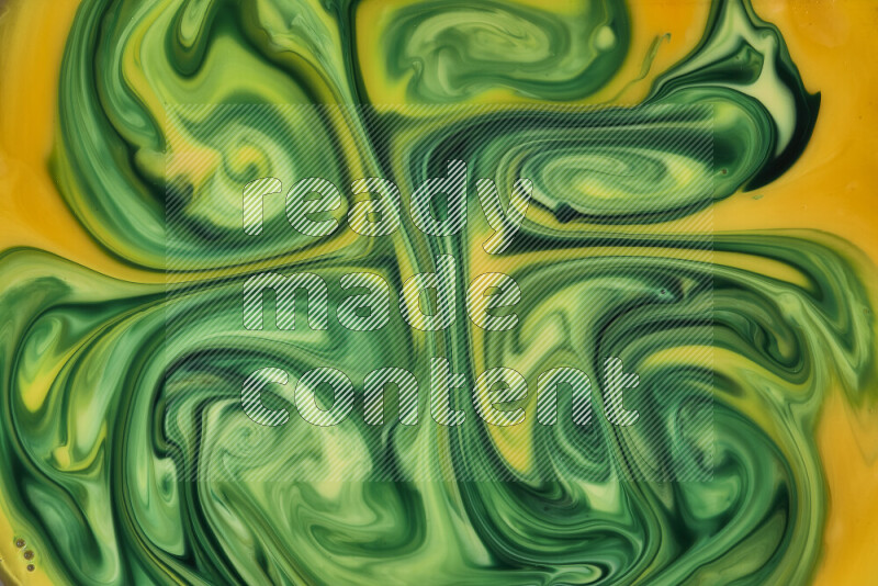 A close-up of abstract swirling patterns in orange and green