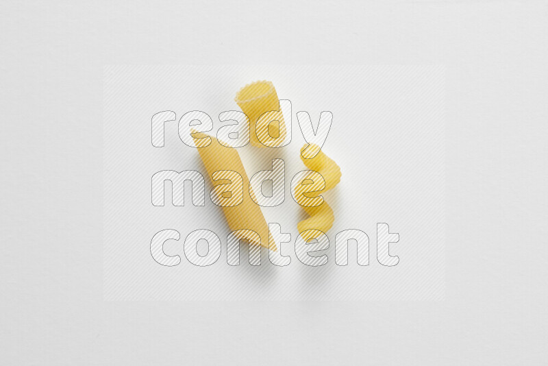 Different pasta types on white background