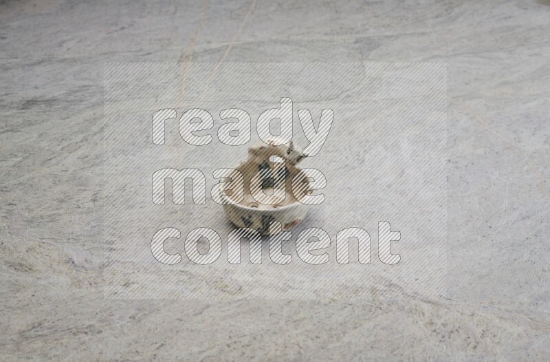 A pottery soap holder on grey marble background