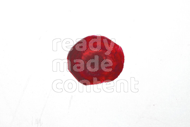 Beet slices on illuminated white background