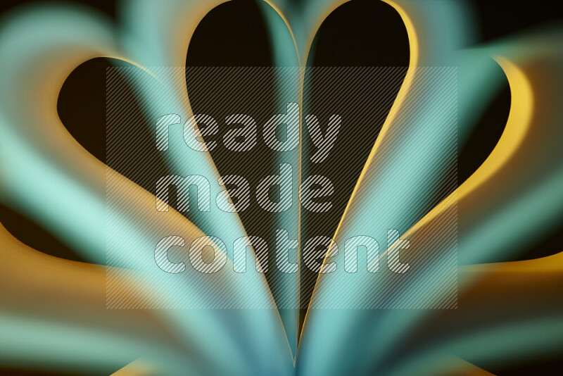 An abstract art piece displaying smooth curves in yellow and green gradients created by colored light