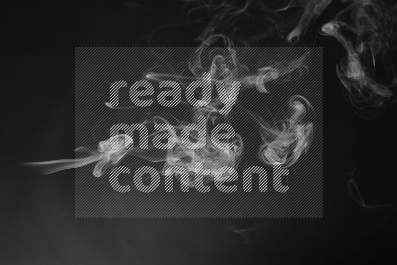 Motion of wavy smoke isolated on dark background