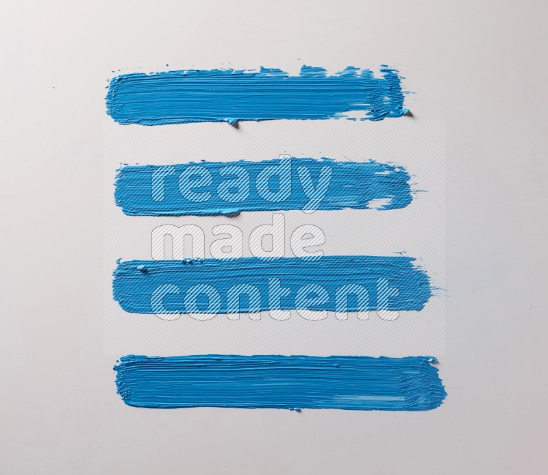 Multi blue straight brush strokes in different shapes on a white background