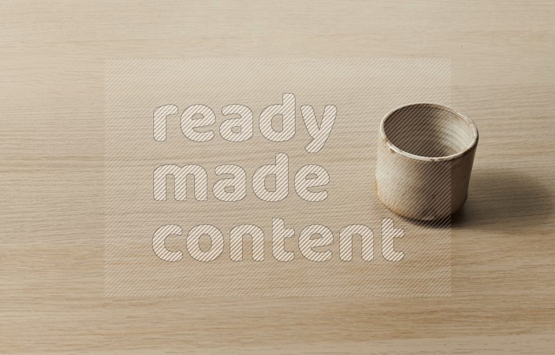 Pottery Cup on Oak Wooden Flooring, 45 degrees