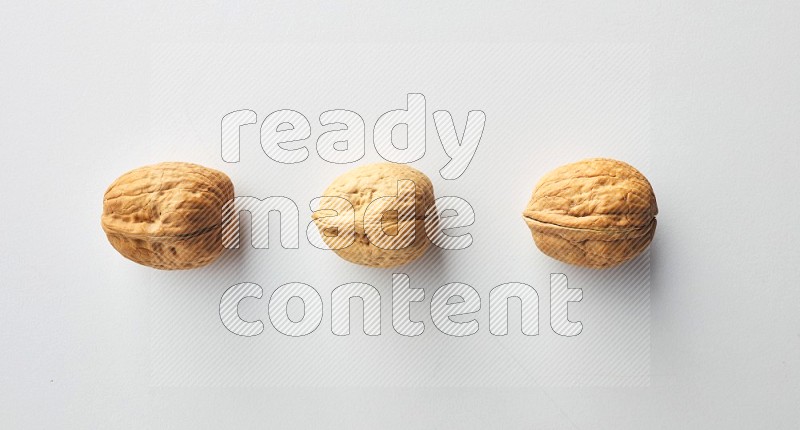 Top-view shot of walnut on white background