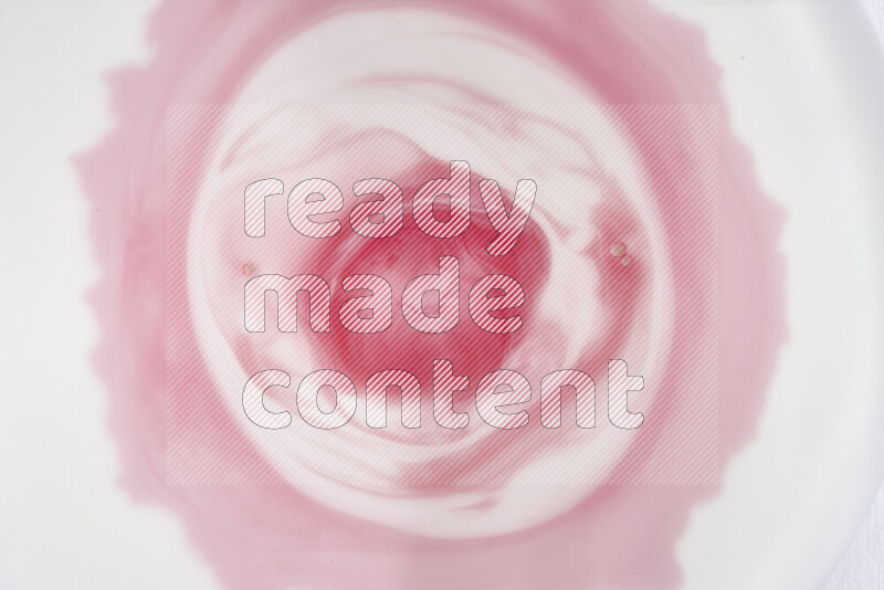 لقطة مقربة لأنماط دوامية باللون الأحمر والأبيض