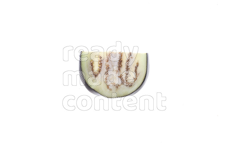 Eggplant slices on illuminated white background