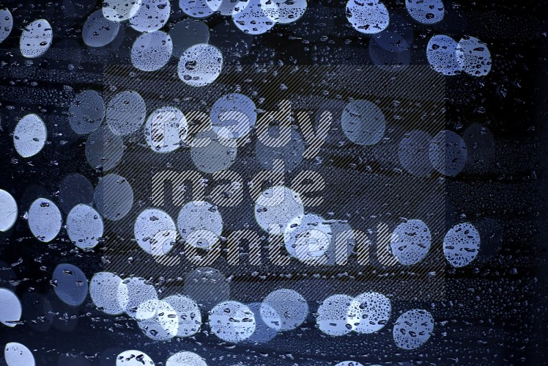 Bokeh light in white with water drops