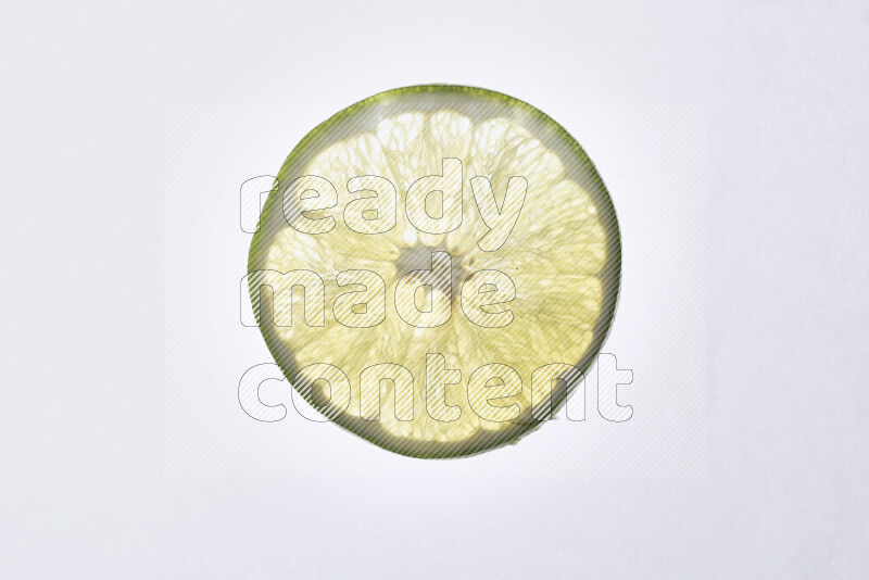 Orange slices on illuminated white background