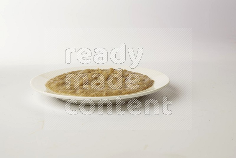 fava bean in a white plate direct on a white background