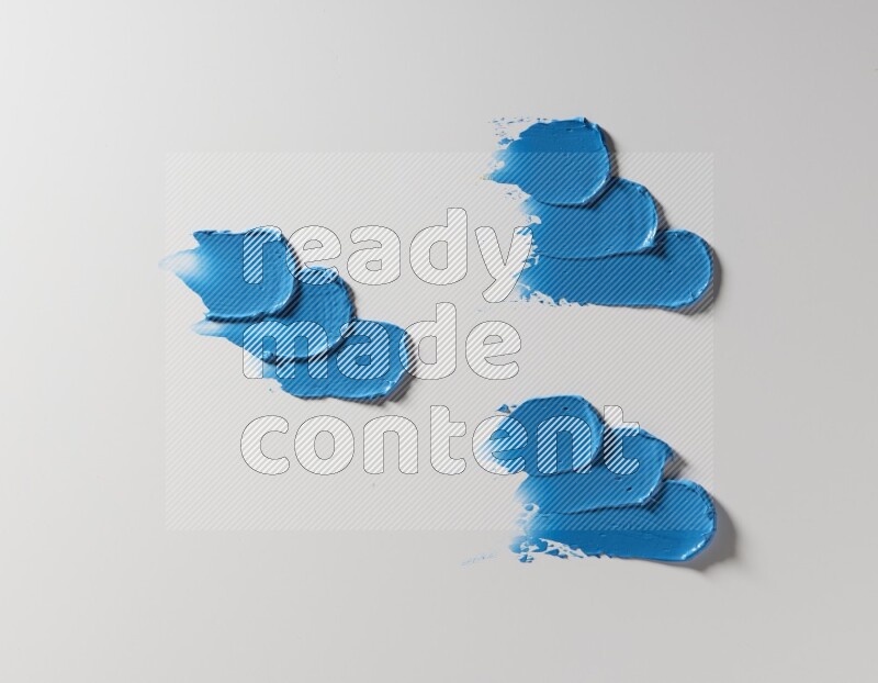 Blue painting knife strokes on white background