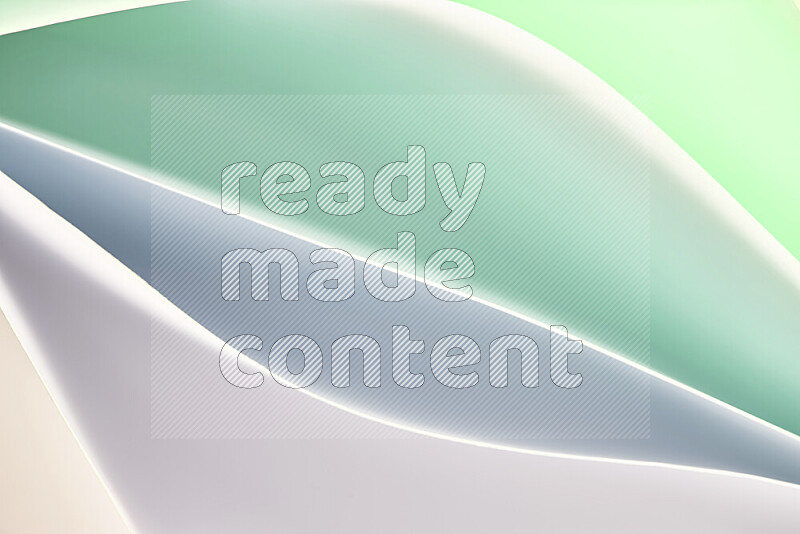 This image showcases an abstract paper art composition with paper curves in green and white gradients created by colored light