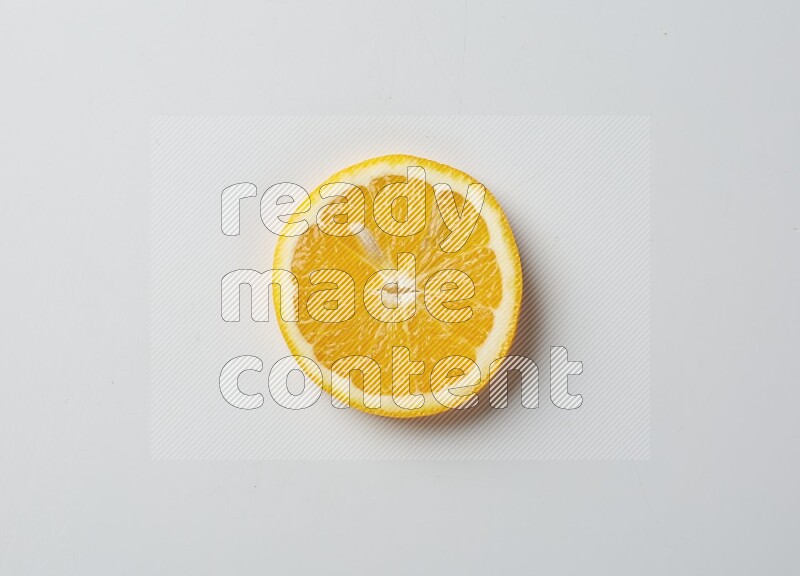 A Single orange slice on white background