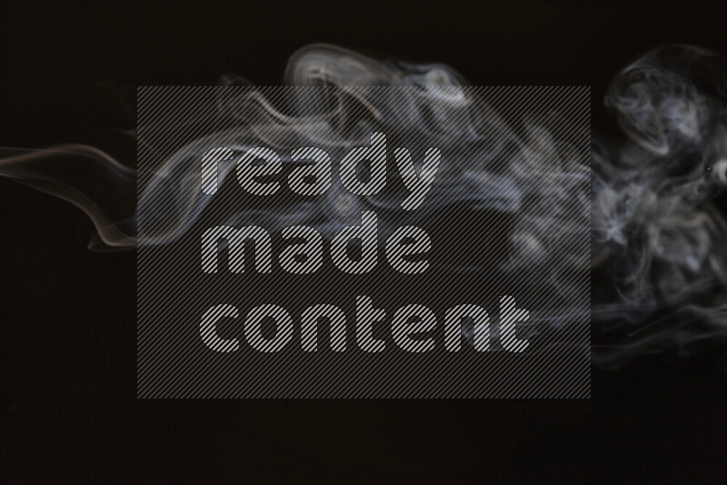 Motion of wavy smoke isolated on dark background