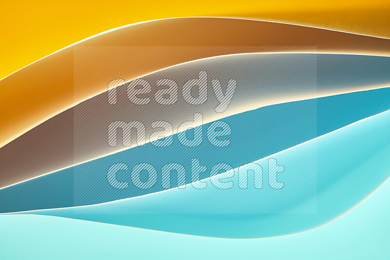 This image showcases an abstract paper art composition with paper curves in blue and orange gradients created by colored light