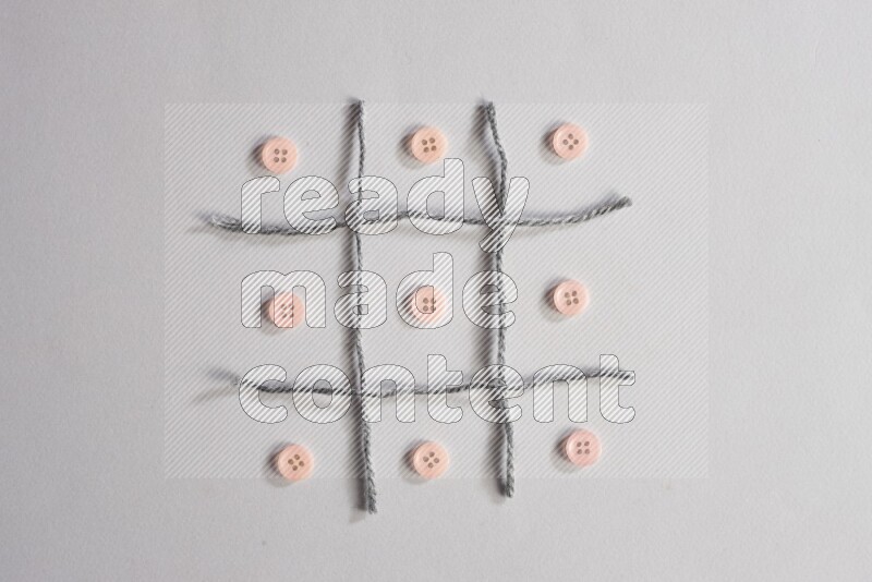 أزرار زهرية موضوعة علي خلفية رمادية