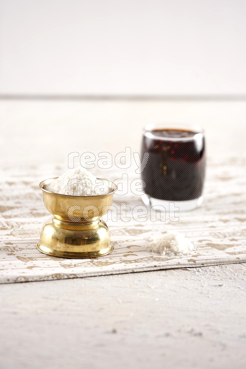 Dried fruits in a metal bowl with tamarind in a light setup