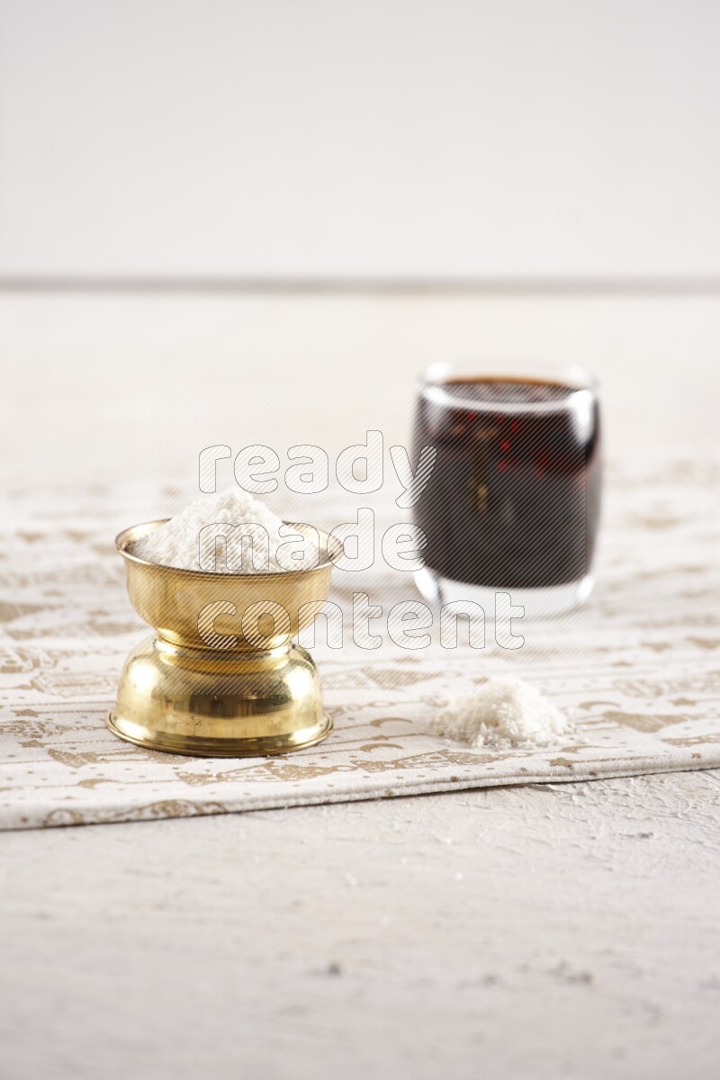 Dried fruits in a metal bowl with tamarind in a light setup