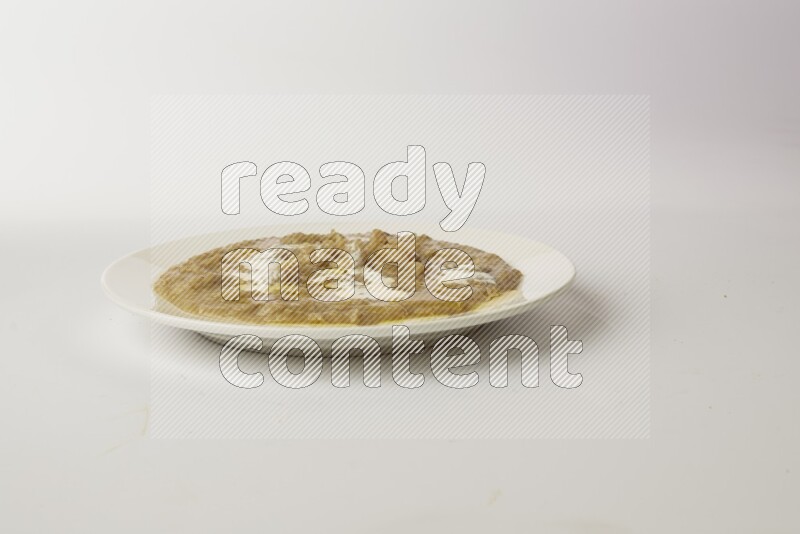fava bean in a white plate direct on a white background