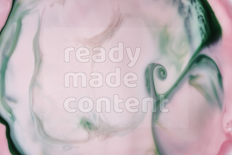 صورة مقربة لأنماط دوامية مجردة باللون الأحمر والأخضر