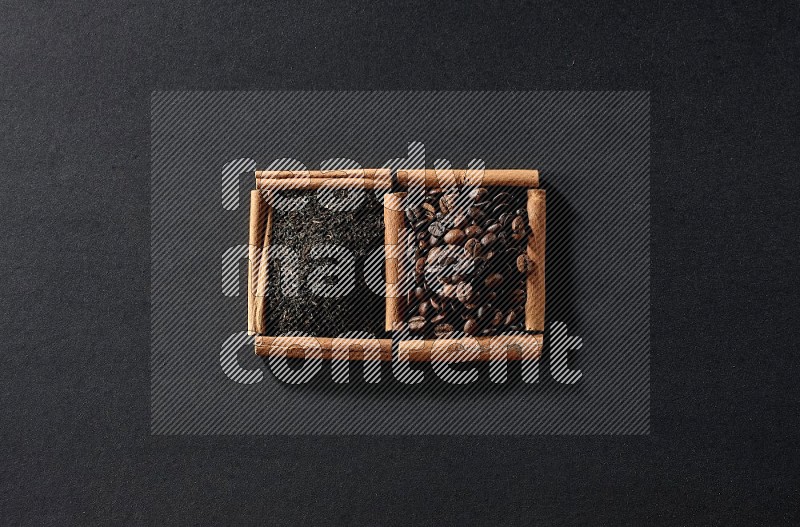 مربعان من أعواد القرفة ممتلئان بحبوب القهوة والشاي الأسود علي خلفية سوداء