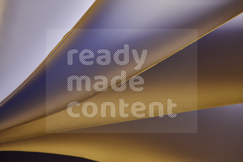 An abstract art piece displaying smooth curves in warm and cold gradients created by colored light