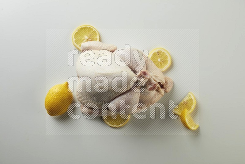 Whole fresh chicken direct on a white background