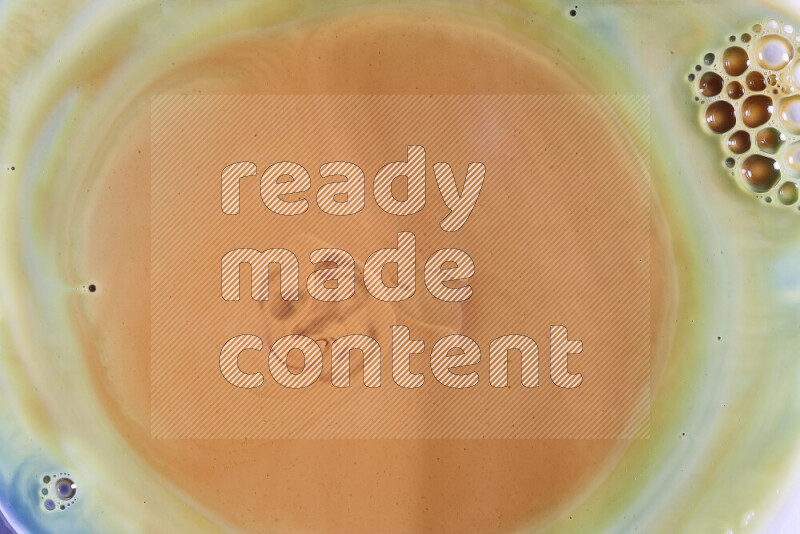 لقطة مقربة لأنماط دوامية باللون البرتقالي