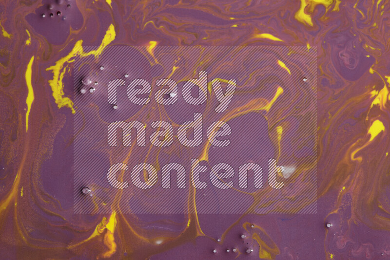 Abstract colorful background with mixed of purple and yellow paint colors