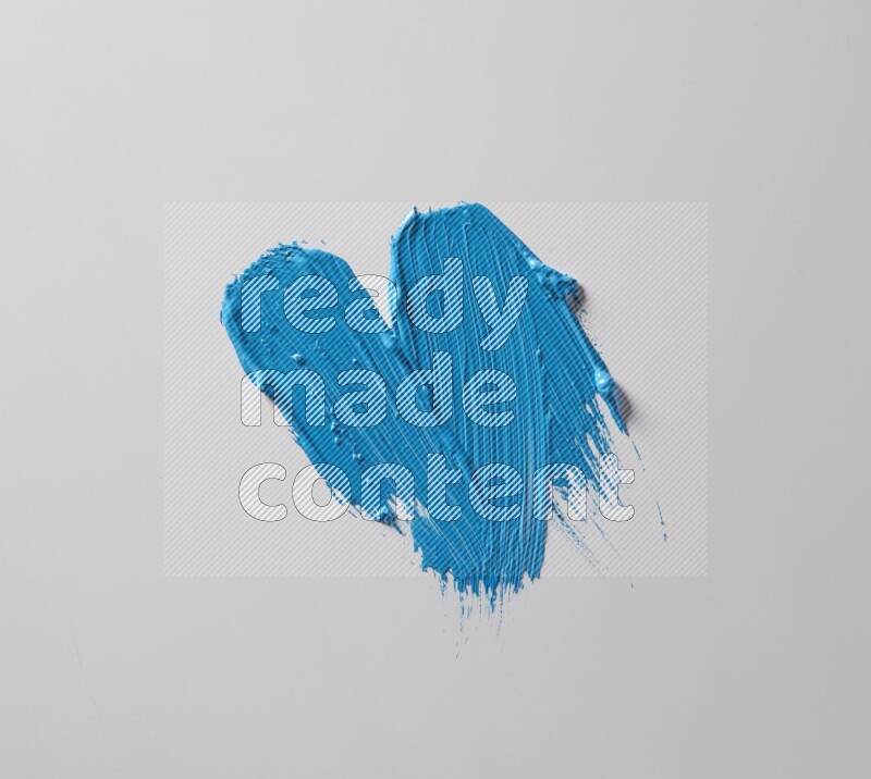 Multi blue straight brush strokes in different shapes on a white background