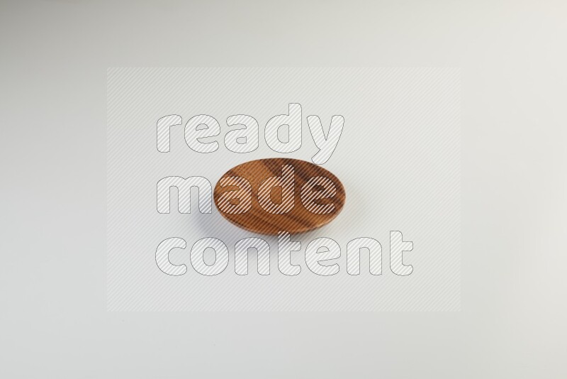 Wooden bowl and plate on white background
