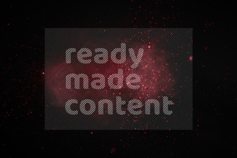 Red powder explosion on black background