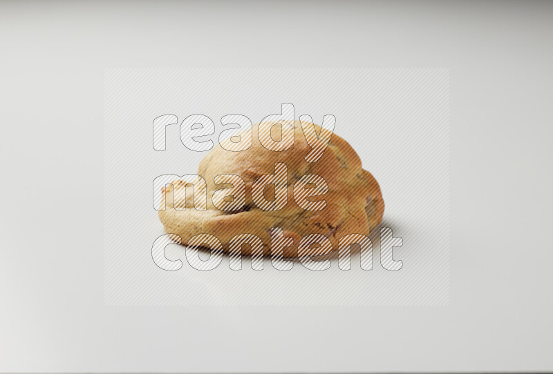 a chocolate chip cookie on a white background