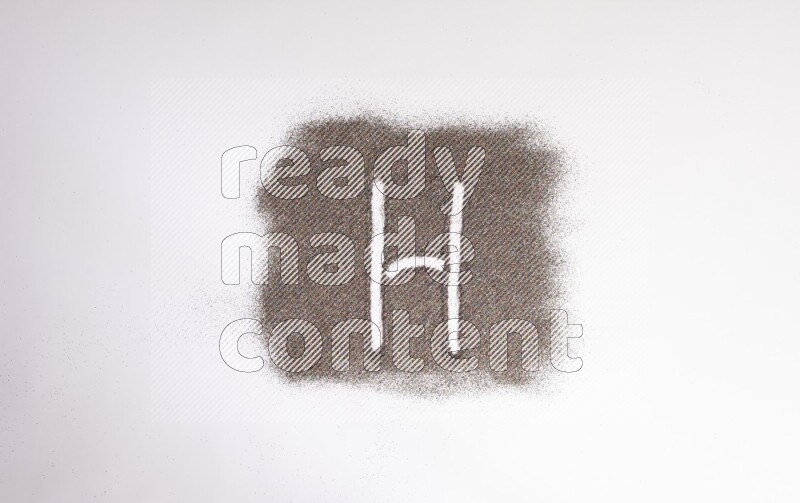 Alphabets written with glitter on white background