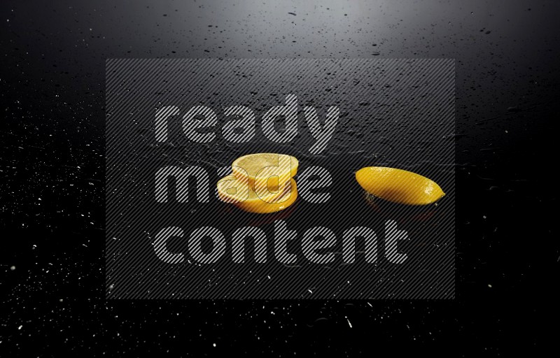 Lemon slices with water drops, and droplets on black background