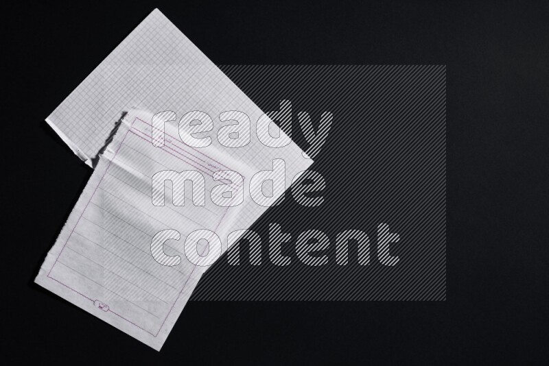 Notebook sheet on black background