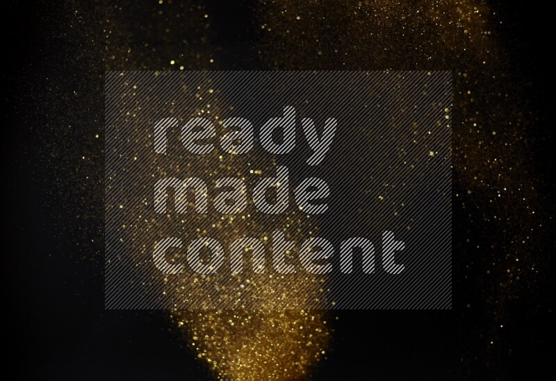 Gold glitter powder isolated on black background