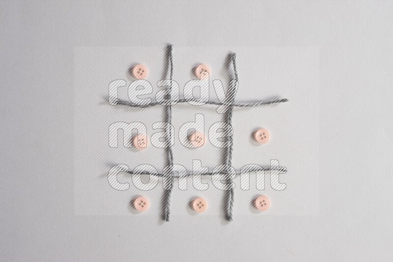 أزرار زهرية موضوعة علي خلفية رمادية