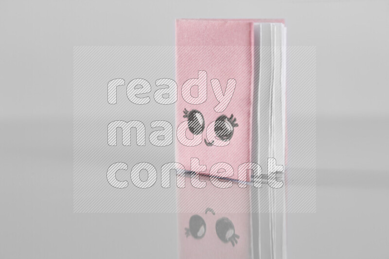 Origami book on grey background