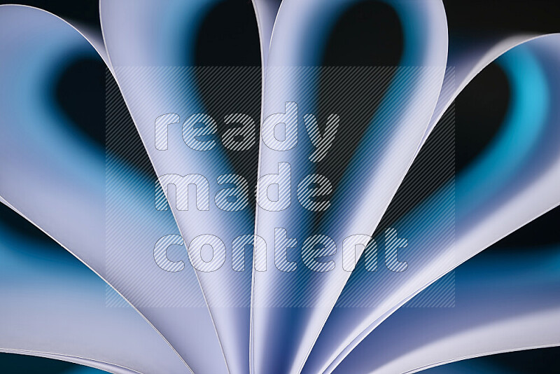 An abstract art piece displaying smooth curves in white and blue gradients created by colored light