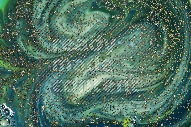 لقطة مقربة لبريق ذهبي متلألئ منتشر على خلفية من اللون الأزرق والأخضر في حركات دائرية