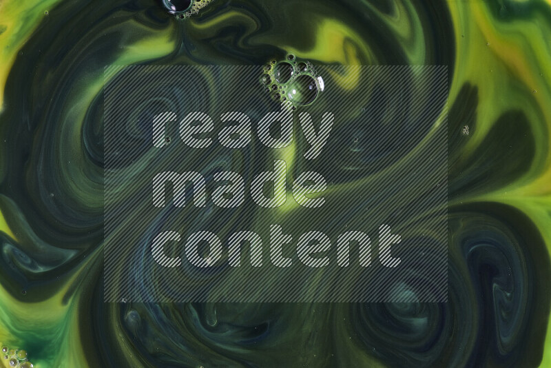 A close-up of abstract swirling patterns in green gradients