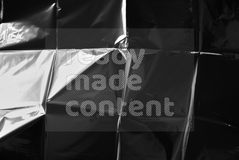 Plastic wrap texture on black background