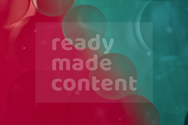 Close-ups of abstract oil bubbles on water surface in shades of green and red