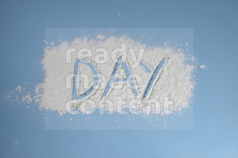 A word written with powder on blue background