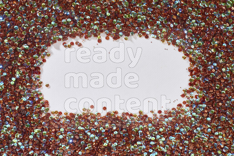 Multicolored flat sequins on grey background