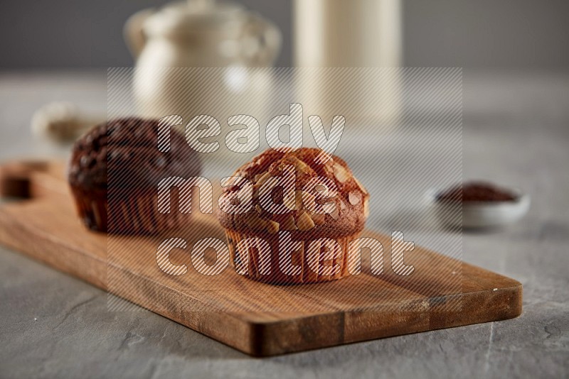 Almond cupcake on a wooden board