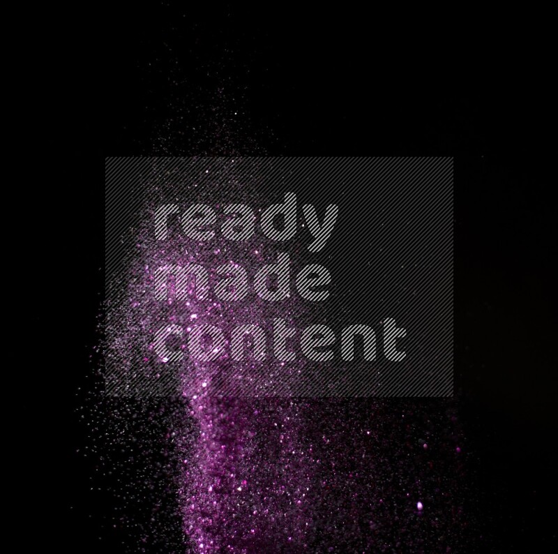 Pink glitter powder isolated on black background
