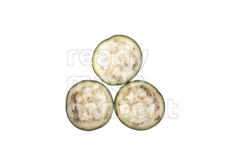 Eggplant slices on illuminated white background